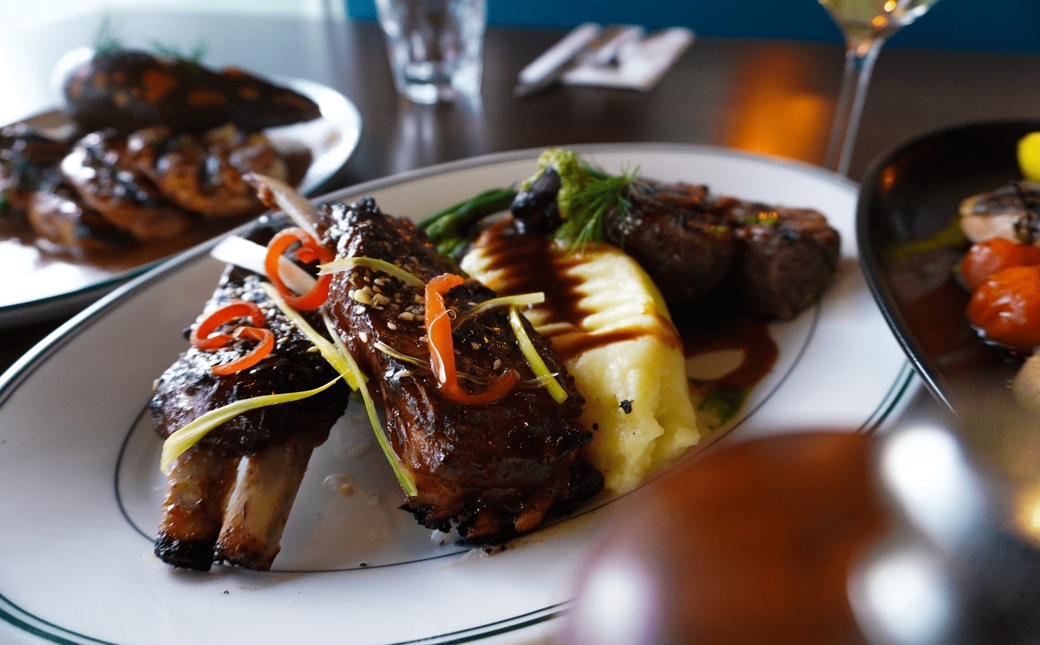 Sticky pork ribs served with creamy mash and jus